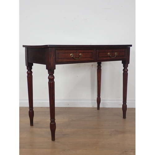 302 - A Regency style oak Side Table fitted two frieze drawers mounted upon fluted supports 3ft W x 2ft 5i... 