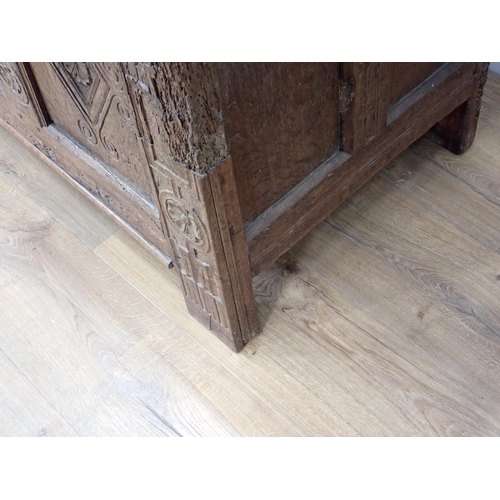 307 - A late 17th Century and later oak Coffer with sunken three panel lid and lozenge carved front (woodw... 