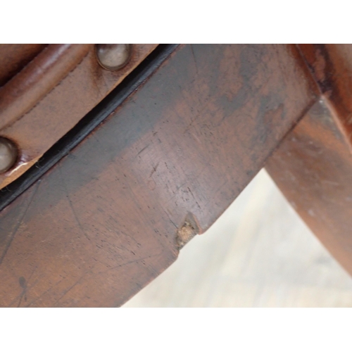 309 - A circular mahogany Stool with brown leather top and a modern leather effect covered Swivel Chair