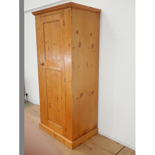 320 - A pine single door Cupboard 6ft 7in H x 3ft W