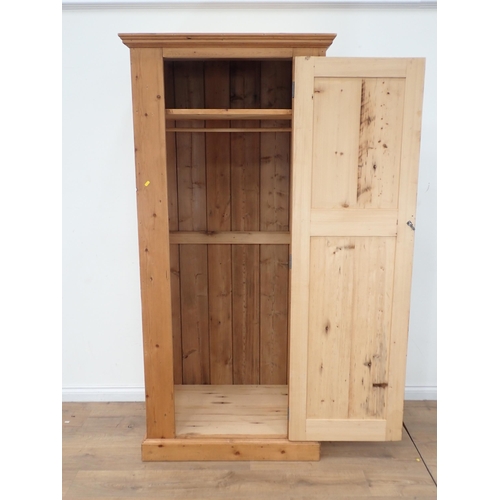 320 - A pine single door Cupboard 6ft 7in H x 3ft W