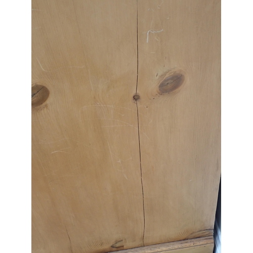 320 - A pine single door Cupboard 6ft 7in H x 3ft W