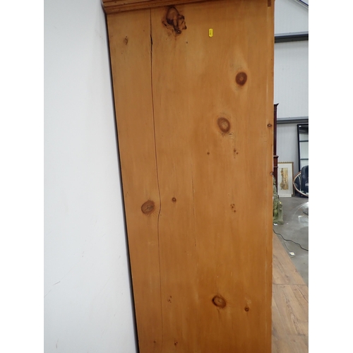 320 - A pine single door Cupboard 6ft 7in H x 3ft W