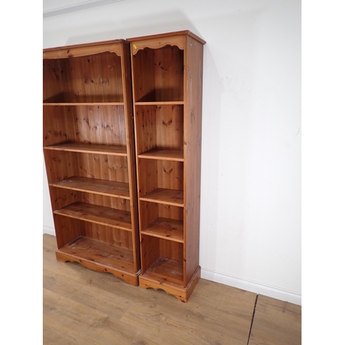 325 - Two modern pine open Bookcases 6ft 3in H x 3ft 1in W and 6ft 3in H x 1ft 5in W