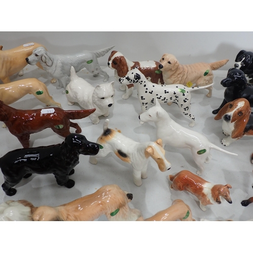 331 - A collection of Beswick and other Dog and Fox Figures