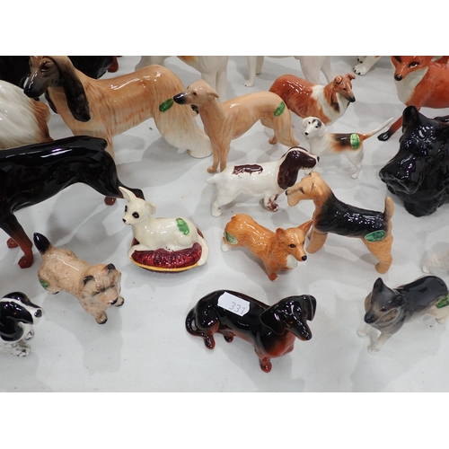 331 - A collection of Beswick and other Dog and Fox Figures