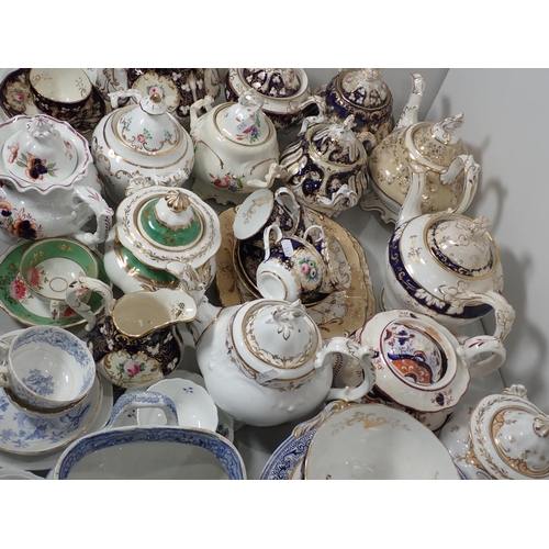 342 - A large quantity of mainly 19th Century Engliash china Tea Pots, Sucriers, Plates, Cups and Saucers,... 