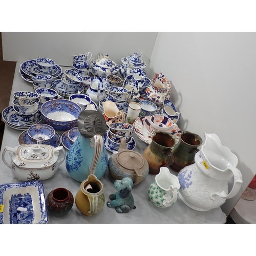 349 - A quantity of 19th Century blue and white Tea Wares, two pottery Jugs, Dog Figure, etc.