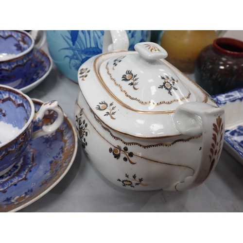 349 - A quantity of 19th Century blue and white Tea Wares, two pottery Jugs, Dog Figure, etc.