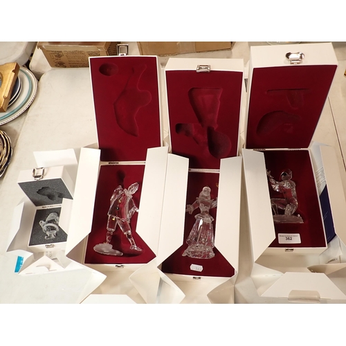 362 - Three boxed Swarovski glass Clown Figures and a Father Christmas