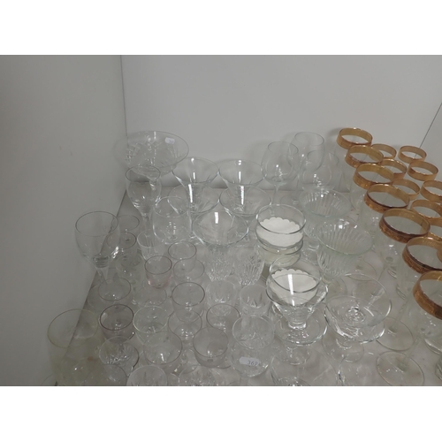 369 - A suite of Wine and long Glasses with gilded Greek Key frieze and assorted other glassware