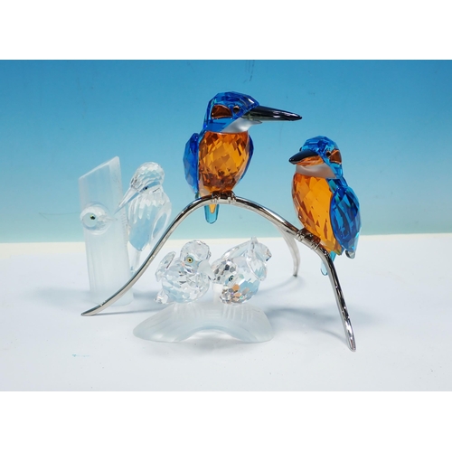 377 - A boxed Swarovski crystal pair of Kingfishers, a pair of Woodpeckers and a pair of Doves