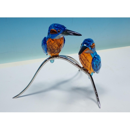 377 - A boxed Swarovski crystal pair of Kingfishers, a pair of Woodpeckers and a pair of Doves