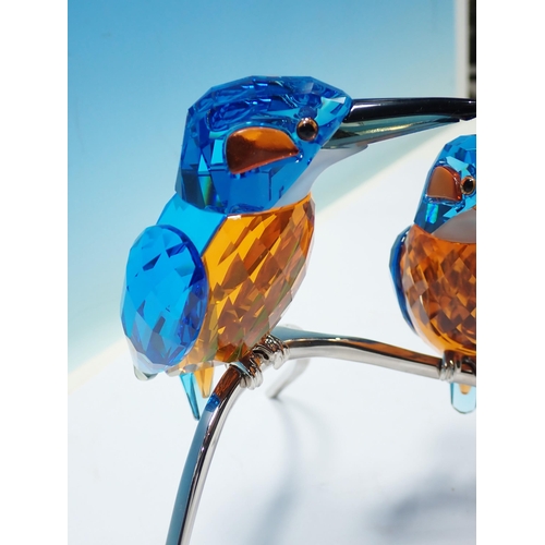 377 - A boxed Swarovski crystal pair of Kingfishers, a pair of Woodpeckers and a pair of Doves