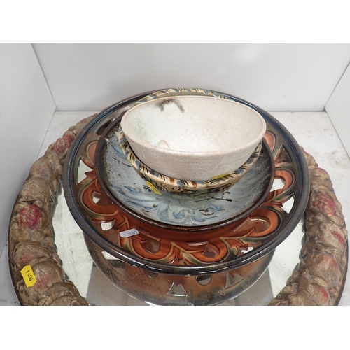 381 - A circular gilt framed Mirror, four pottery Bowls and an envelope of Stamps