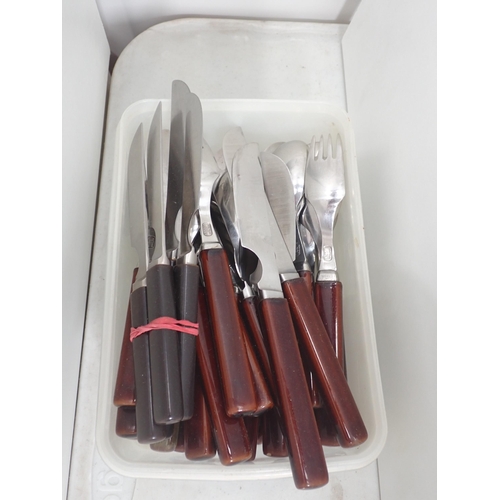 394 - Two sets of Denby Cutlery