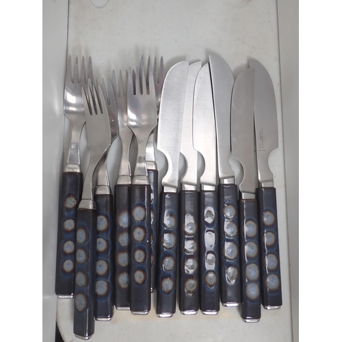 394 - Two sets of Denby Cutlery