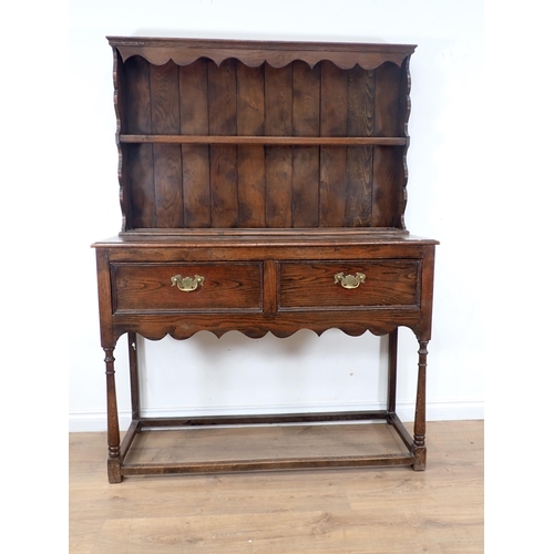 623 - An oak Dresser and Rack fitted two frieze drawers 5ft 5in H x 4ft 1in W