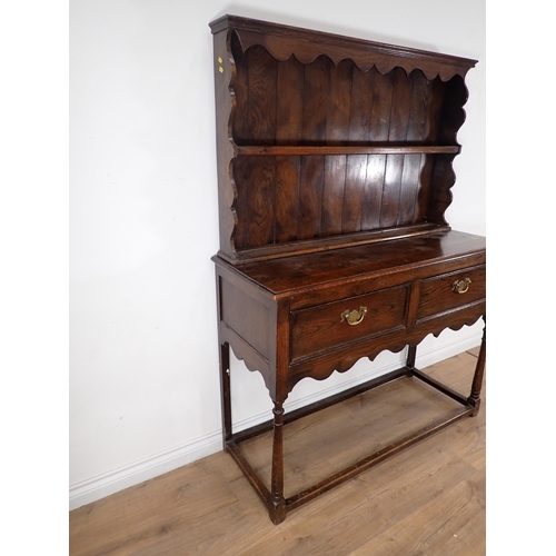 623 - An oak Dresser and Rack fitted two frieze drawers 5ft 5in H x 4ft 1in W