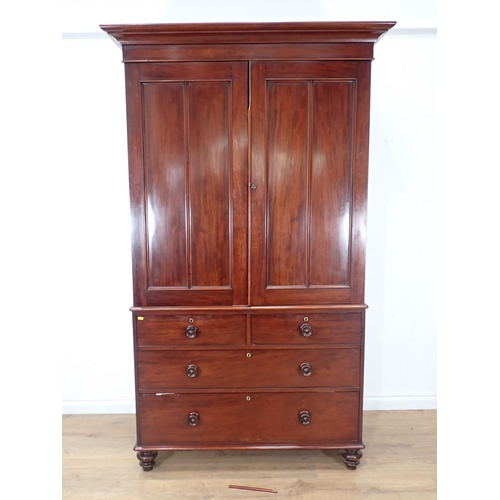 624 - A Victorian mahogany Linen Press fitted pair of cupboard doors above base fitted two short and two l... 