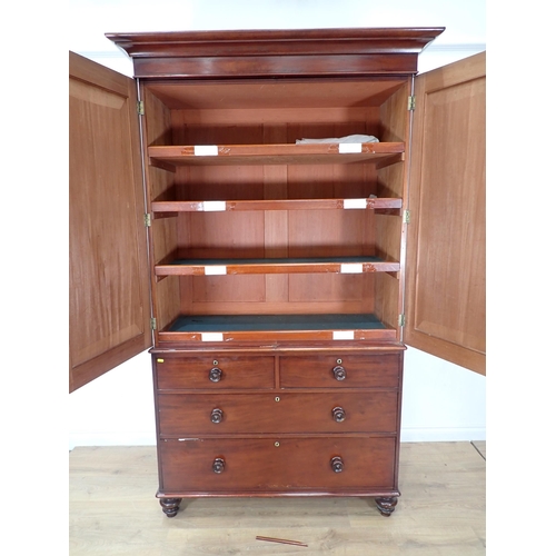 624 - A Victorian mahogany Linen Press fitted pair of cupboard doors above base fitted two short and two l... 