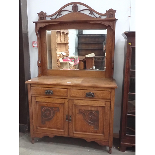 628 - An Arts and Crafts oak mirror back Sideboard fitted two drawers and pair of carved cupboard doors 6f... 