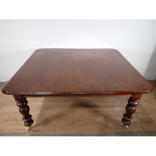 79 - A Victorian mahogany Dining Table on bobbin turned supports and casters 4ft 11in W x 2ft 5in H