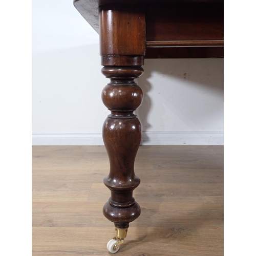 79 - A Victorian mahogany Dining Table on bobbin turned supports and casters 4ft 11in W x 2ft 5in H