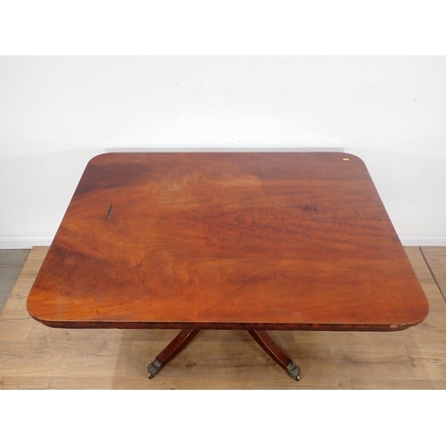 88 - A 19th Century mahogany rectangular Breakfast Table on four supports with brass paw toe caps 4ft 4in... 