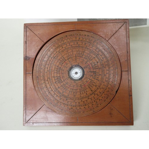 228 - A wooden Feng (Fung) Shui Geomantic Compass and pages of notes relating to Feng Shui