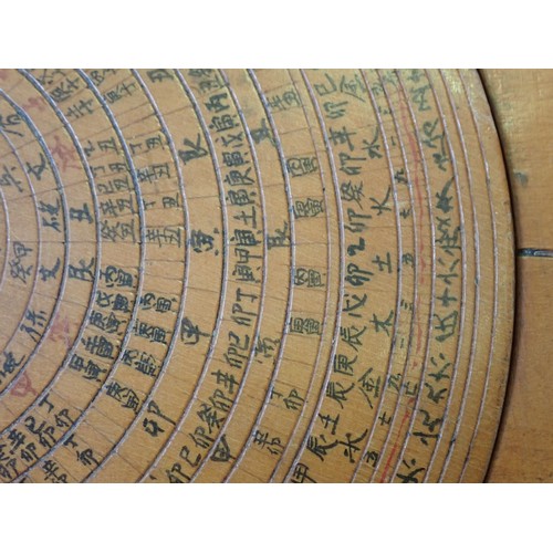 228 - A wooden Feng (Fung) Shui Geomantic Compass and pages of notes relating to Feng Shui