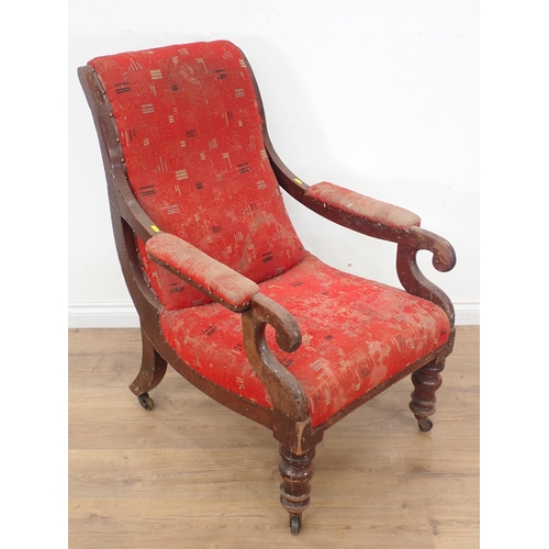 250 - A red upholstered Victorian Armchair on turned front supports and casters (moth damage A/F) and anot... 