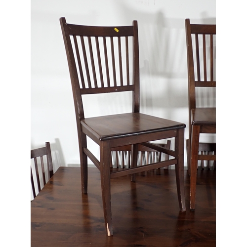 262 - A modern stained pine Dining Table 6ft 5in W x 2ft 6in H and eight Dining Chairs