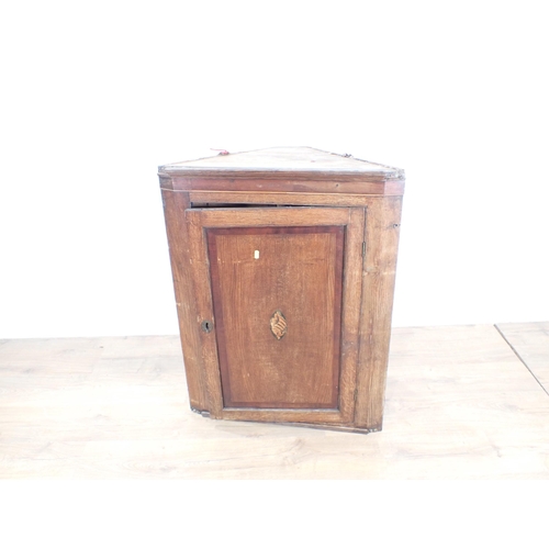 268 - A Georgian oak and shell inlaid hanging Corner Cupboard A/F 3ft H x 2ft 4in W