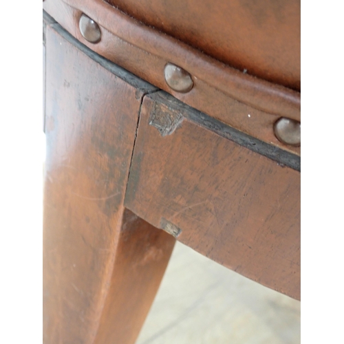 282 - A circular mahogany Stool with brown leather top and a modern leather effect covered Swivel Chair