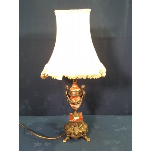 284 - A red Onyx Table Lamp of urn form with Putti and Swag brass decoration mounted on brass base with ar... 