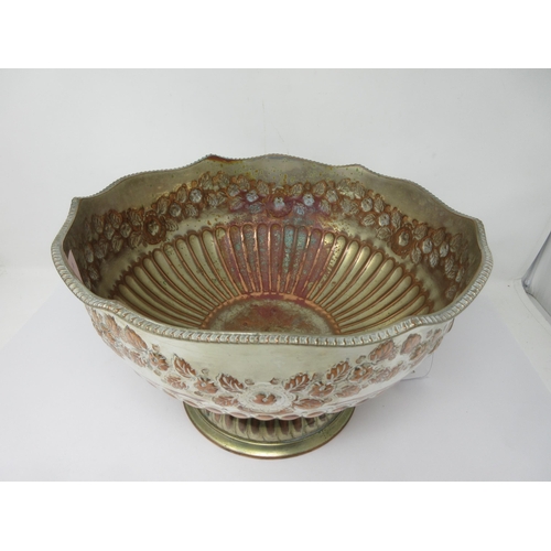 286 - A plated on copper Punch Bowl, semi-fluted embossed floral swags, lion mask and ring handle, 13in di... 