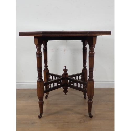 293 - A Victorian walnut octagonal Centre Table on turned supports 2ft 5in W x 2ft 4in H