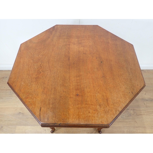 293 - A Victorian walnut octagonal Centre Table on turned supports 2ft 5in W x 2ft 4in H