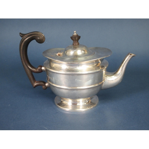 101 - A George V silver circular Teapot with ebonised scroll handle, Birmingham 1911, 374gms all in