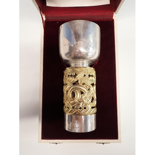 139 - A silver and gilt limited edition commemorative goblet by John Sutherland Hawes, London 1976, with a... 