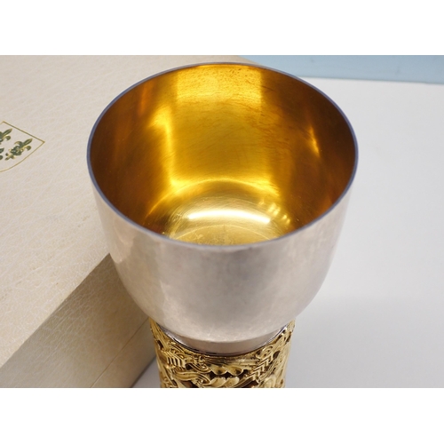 139 - A silver and gilt limited edition commemorative goblet by John Sutherland Hawes, London 1976, with a... 