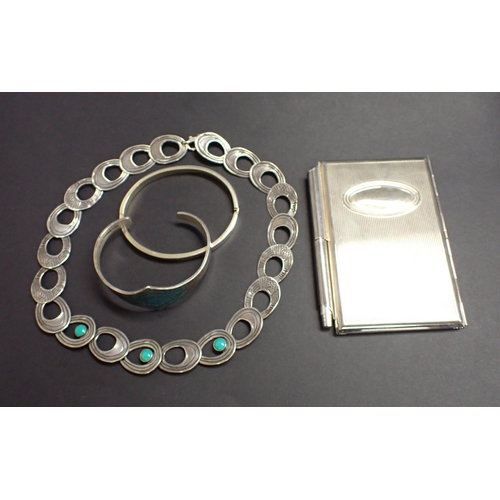 176 - An oval link Collarette the front set three turquoise, stamped 925, a Mexican silver Bangle set turq... 