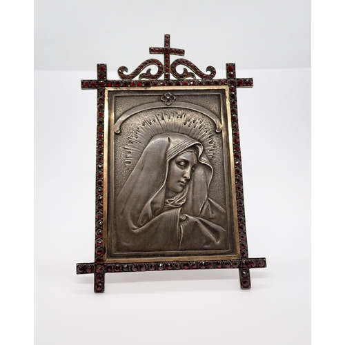 189 - An embossed white metal Religious Icon of the Madonna in frame set garnet type beads, 3in x 4 1/2in