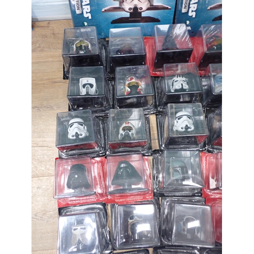 2 - Thirty boxed Star Wars Helmet Collection Models with two Booklets