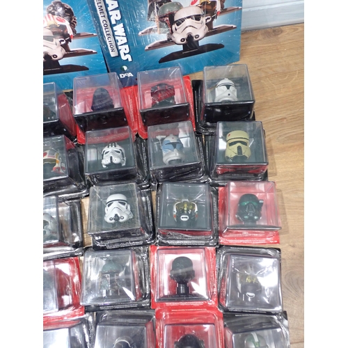 2 - Thirty boxed Star Wars Helmet Collection Models with two Booklets