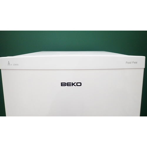 201 - A Beko A+ Class Fridge Freezer 5ft H x 1ft 9in W, passed PAT