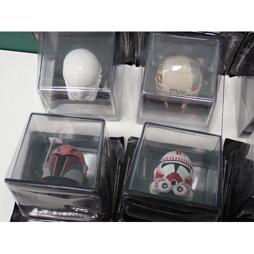 23 - Twenty two boxed Models of Star Wars Helmets