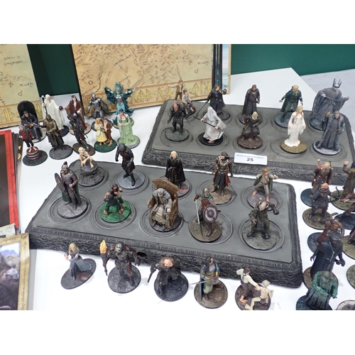 25 - A quantity of unboxed Lord of the Rings Figures, Stands and Collector's Manuals