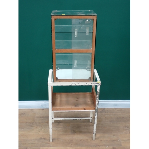 312 - A glass Shop Display Cabinet on associated white painted metal stand 4ft 3in H x 1ft 7in W